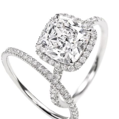Well, the wait is over! Harry Winston cushion cut; 3 carat diamond engagement ring ...
