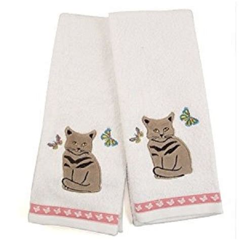 Two White Towels With Cats On Them And Butterflies In The Middle One