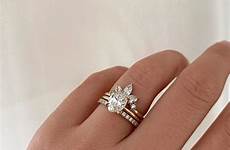 oval solitaire wedding instagram ring engagement rings bands stack crown iconic louise ceremonial trio jean star