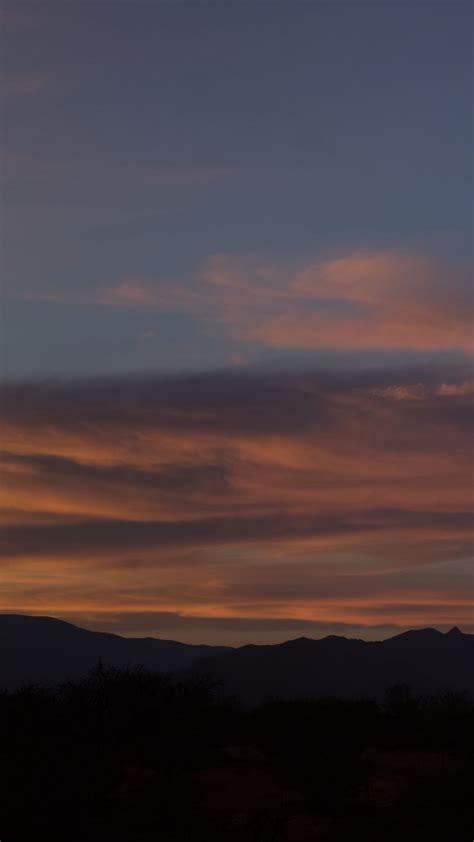 Download Wallpaper 1350x2400 Sunset Mountains Sky Clouds Evening