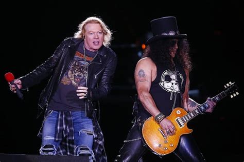 Meanwhile, axl rose and izzy stradlin got together to play in several bands. Slash on 'Living the Dream,' Guns N' Roses and Axl Rose feud