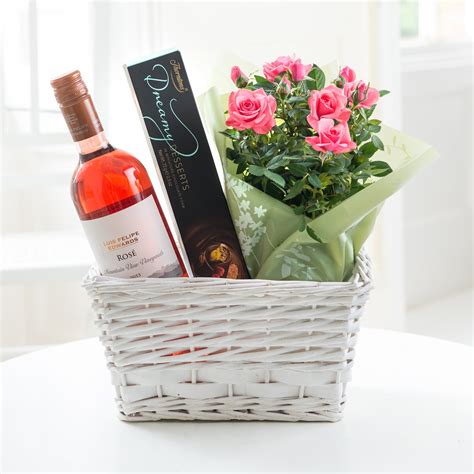 The bouquet was beautiful and the chocolates were gourmet quality. Rose Wine Gift Set | FlyingFlowers.co.uk