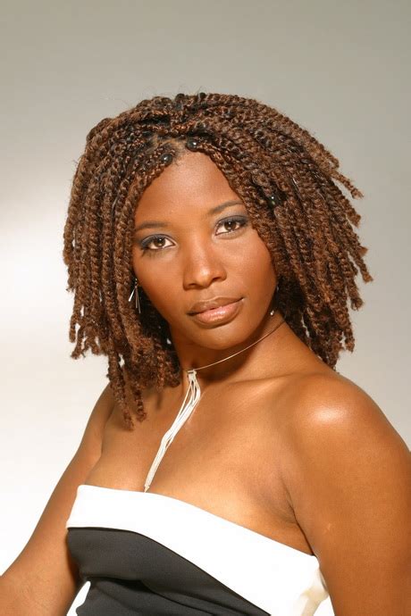 Natural hair twists that are not taken down or apart are the gift that keeps on giving because they can serve as a protective style and can be accessorized and hair coverings and scarves are certainly on trend because they lend support to the lower maintenance styles that we need during these times. Twist black hairstyles