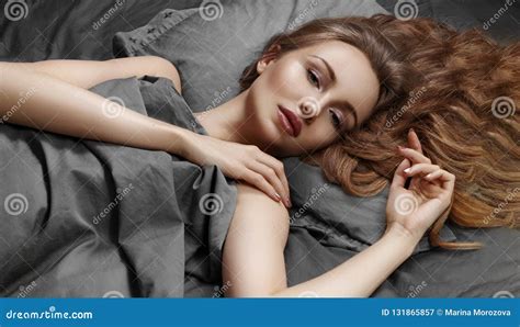Beautiful Woman Sleeping While Lying In Bed With Comfort Sweet Dreams Model Relaxing On Grey