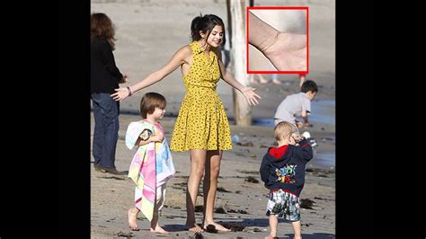 On closer inspection it is clearly just a magic marker scribble on her wrist. Selena gomez tattoos - YouTube