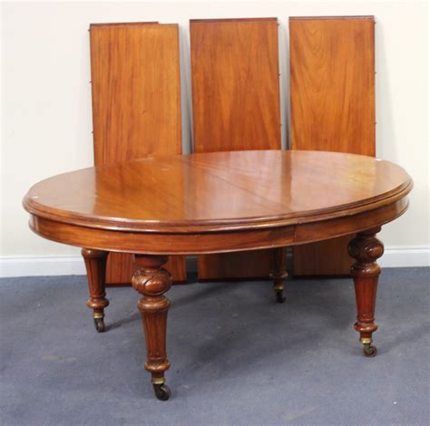A Late Victorian Mahogany Extending Dining Table The Moulded Top With