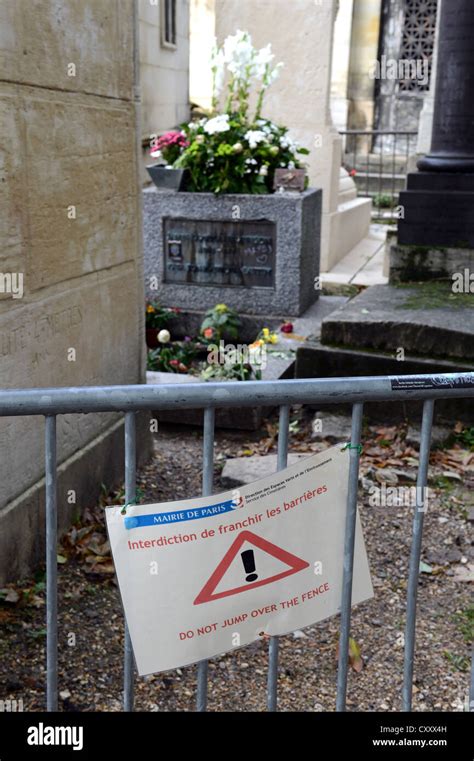 Jim Morrison Grave With Barrier And Warning Notice Père Lachaise