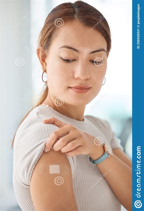 Healthcare Covid And Vaccine With Woman And Bandaid On Arm For Medical Patient And Wellness