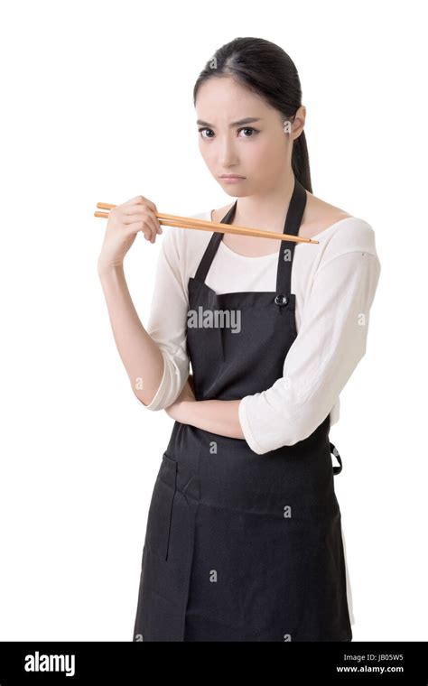Young Asian Housewife Hold A Chopsticks In Apron Closeup Portrait On
