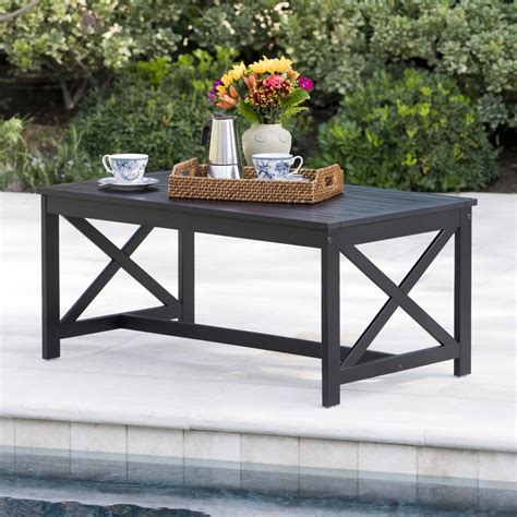 In occasional tables, darker tones and heavier materials, like a wood coffee table, take up more visual space than, say, a glass coffee table. Cristian Outdoor Finished Acacia Wood Coffee Table, Black ...
