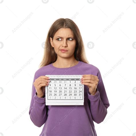 Emotional Young Woman Holding Calendar With Marked Menstrual Cycle Days