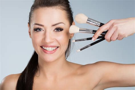 Happy Beautiful Woman Holding Make Up Brushes Stock Photo Image Of