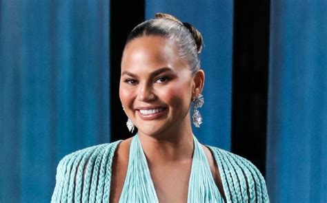 Chrissy Teigen Goes Bold In Green Bralette Shorts And Thigh High Boots