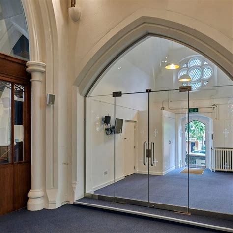 Arched Frameless Glass Screen And Door St Marys Church Ion Glass