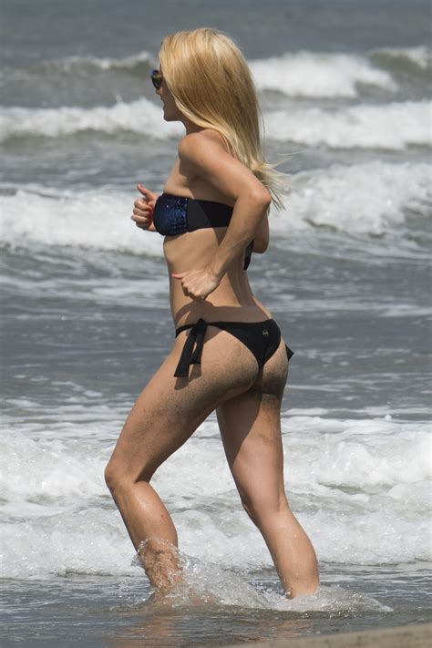 Michelle Hunziker In Bikini On Vocation At A Beach In Italy Hawtcelebs
