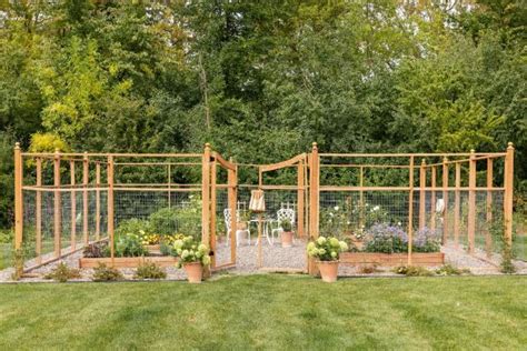 Backyard Raised Garden With Cedar Posts And Mesh Fencing Hgtv