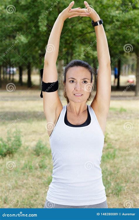 Young Woman Streching Arms Stock Image Image Of Concentration 148280089