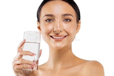 Portrait Of A Happy Smiling Young Woman With A Glass Of Fresh Water