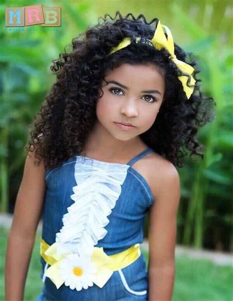 Hispanic Baby Girl With Curly Hair