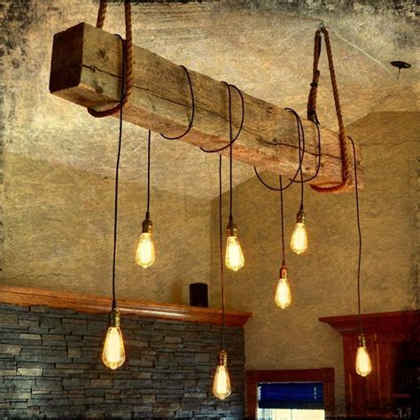 Though we may not think of vanity lights as a country home staple, it turns out that they're pretty handy for lighting projects like this one. 1930s structural beam Edison bulb light fixture project | Rustic light fixtures, Diy light ...