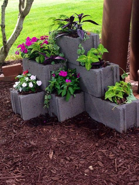 We are going to do landscaping too. Cinder block ideas (120) | Flowerbeds | Cinder block ...