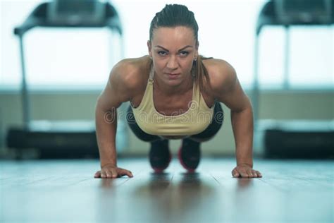 Woman Doing Push Ups On Floor Stock Image Image Of Biceps Center