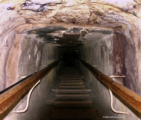 the ascending passage inside the great pyramid of khufu at giza the steps and handrails are a