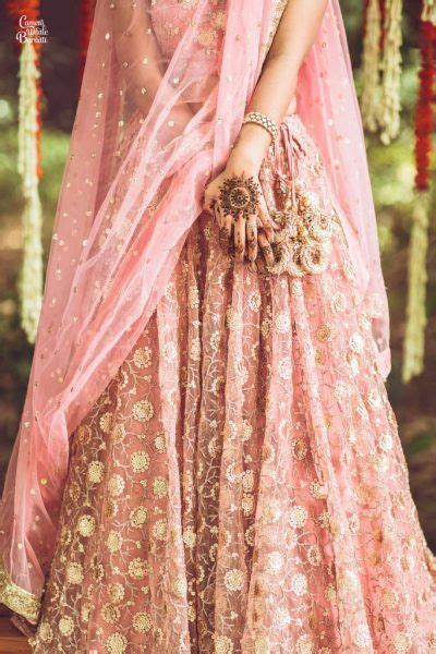 A Beautiful Delhi Wedding Of High School Sweethearts With The Bride In Stunning Outfits
