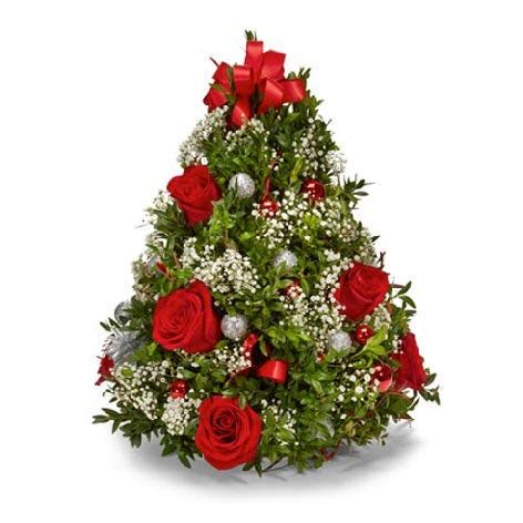 Flowers to germany with prestige flowers. Christmas Tree Flower Arrangement at Send Flowers