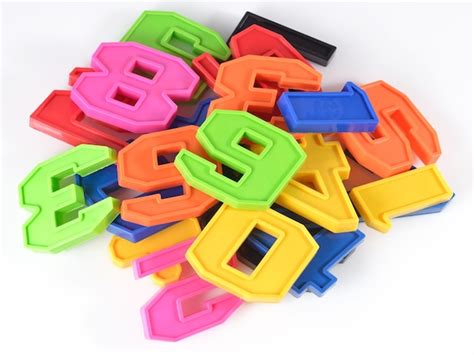 Premium Photo Colorful Plastic Numbers On A White Background