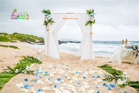 Heart shape altar in the sand with petals. Hawaii beach weddings | custom designed alters on Oahu