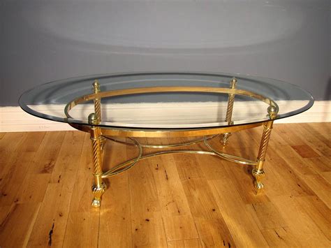 Mid Century Hollywood Regency Brass And Glass Oval Coffee Table 1960s