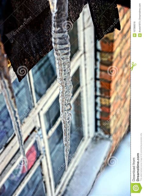 Large Icicles On The Roof Above The Window Stock Photo Image Of