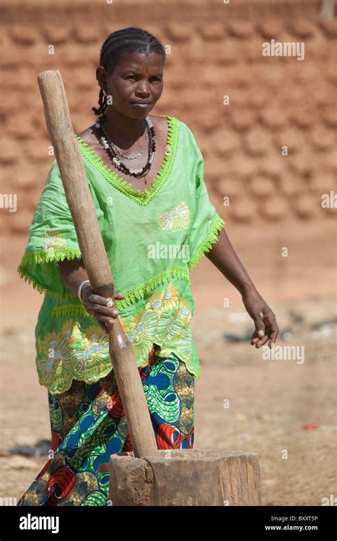 A Fulani Woman In The Town Of Djibo In Northern Burkina Faso Pounds