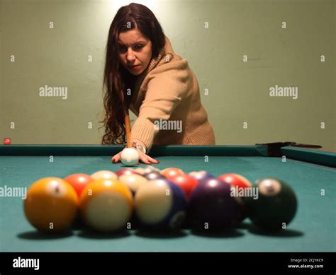 Brunette Caucasian Girl Plays Billiards Stock Photo Alamy