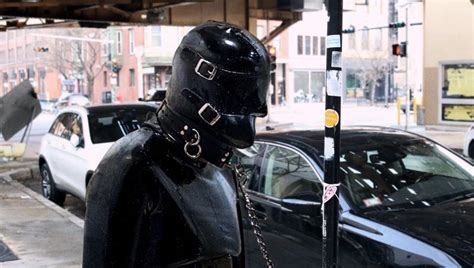 Gimp Tied To Pole On Curb Outside Coffee Shop While Owner Inside Pulled