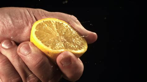 Lemon Squeeze Stock Video Footage For Free Download