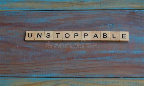 Unstoppable Text On Wooden Square Business And Motivation Quotes Stock