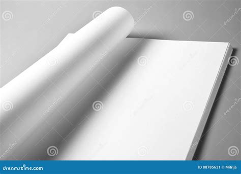 Pile Of Blank Sheets Of Paper With Curled Upper Page Stock Image