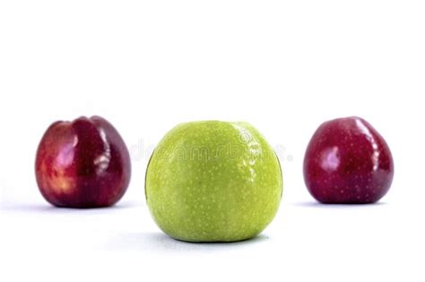 Isolated One Green Apple And Two Red Apples On A White Background Stock