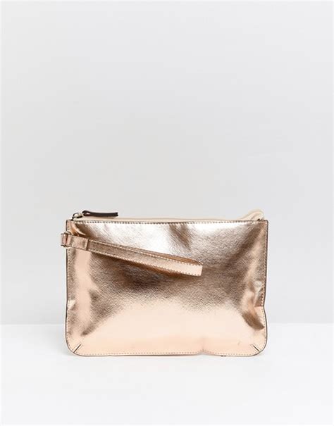 Asos Design Zip Top Wristlet Clutch Bag In Rose Gold Asos