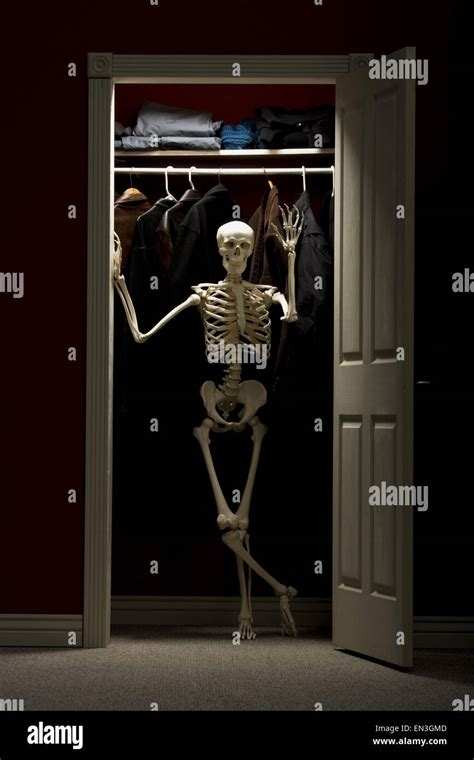 Skeleton Standing In Closet Waving Stock Photo Alamy