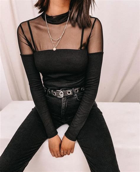 black mesh top with a black belted skinny jeans fashion outfits fashion edgy fashion