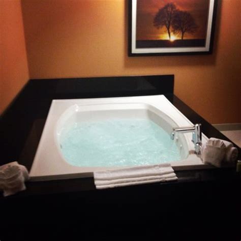 Wingate by wyndham frisco tx. Jacuzzi tub in our suite - Picture of Blue Cypress Hotel ...