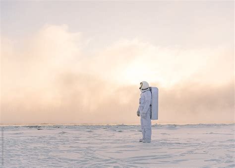 Astronaut In Snowy Field By Stocksy Contributor Alexandr Ivanets