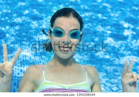 Child Swims Underwater Swimming Pool Happy Stock Photo 1396108544
