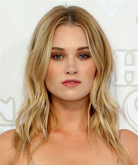 Virginia Gardner Long Wavy Blonde Hairstyle With Layered Bangs And Light Blonde Highlights