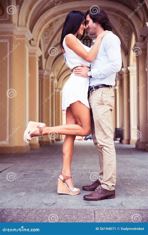 Full Length Portrait Of A Happy Couple Hugging Stock Image Image Of