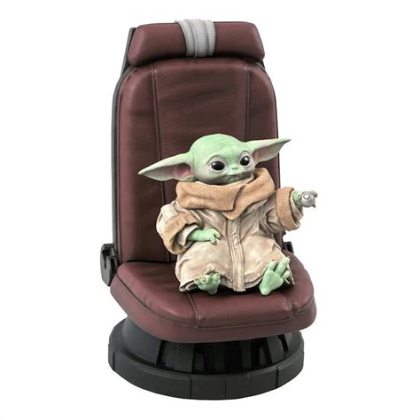 Let Baby Yoda Sit On Your Shelf As A Co Pilot Or Ride On Your Shoulder