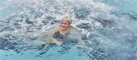 Mature Woman Swimming In Outdoor Thermal Pool With Hydromassage Stock Photo Image Of Outdoor